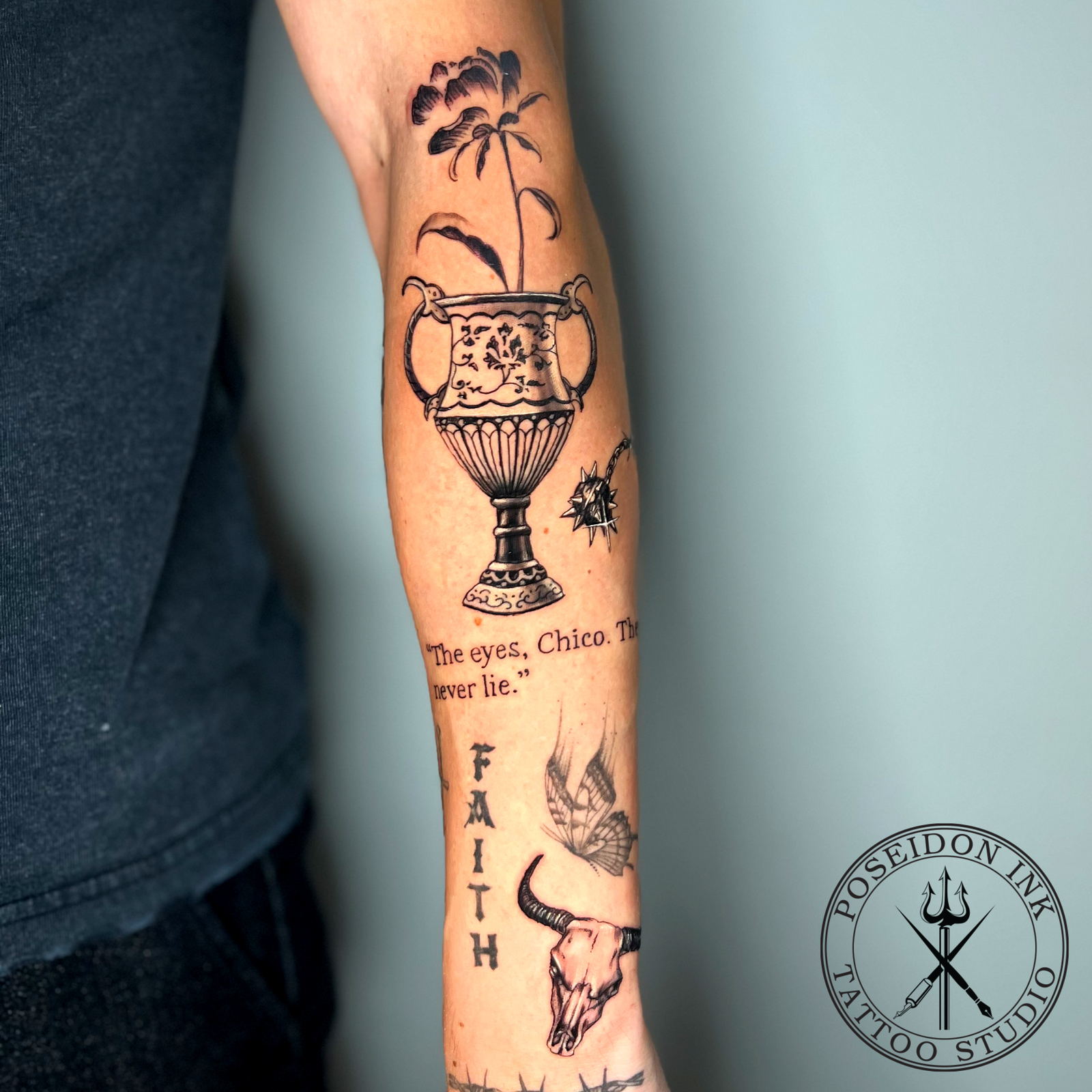 Engraving style tattoo of an antique urn with snake handles holding a long stemmed peony, among patchwork pieces