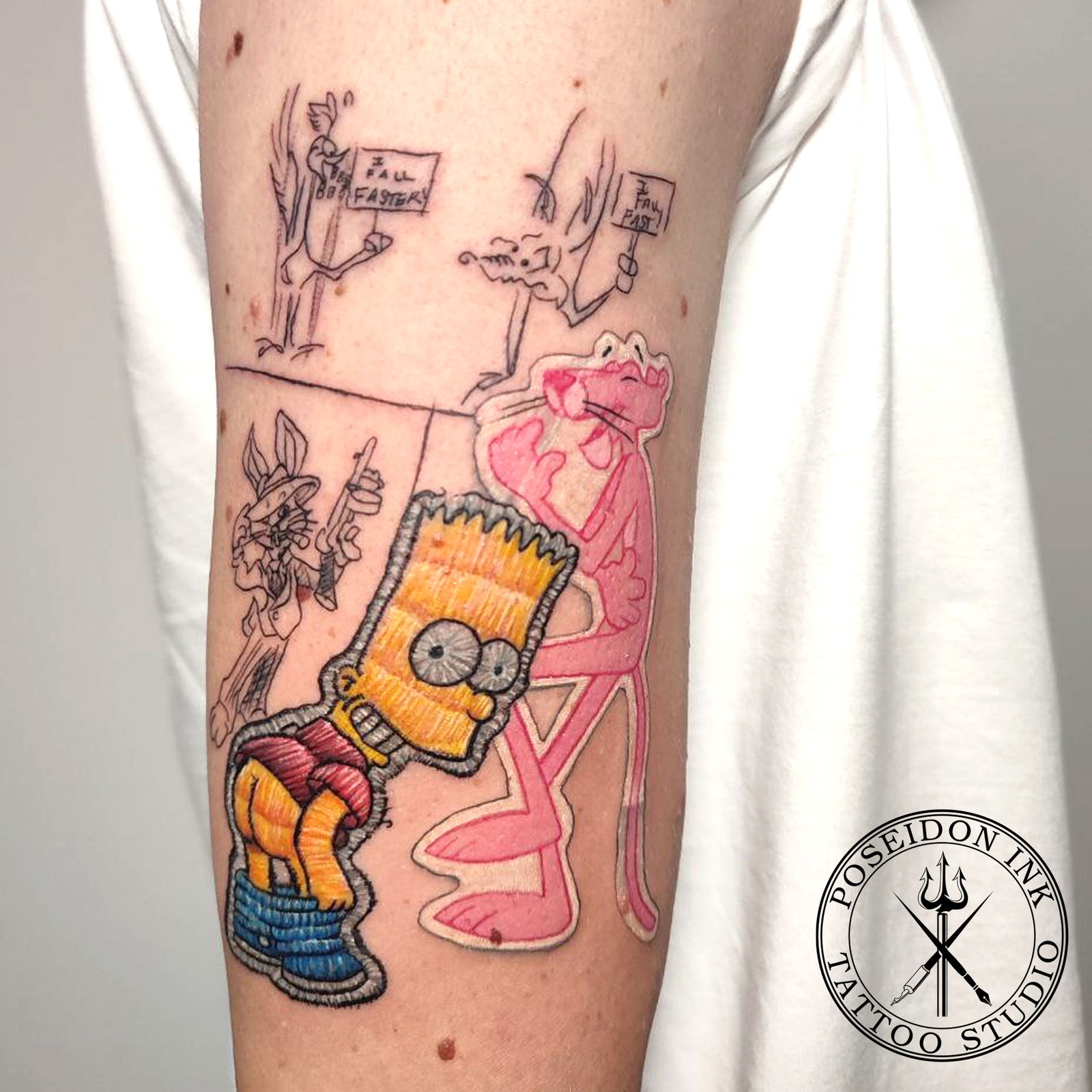 Cartoon tattoos in embroidered patch style beside loose outline sketch cartoons on the upper arm